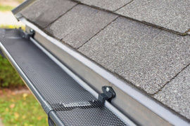 a photo of a neatly installed gutter 